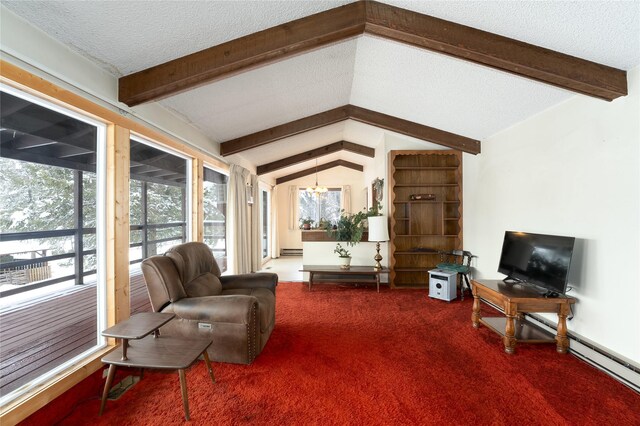 living area featuring lofted ceiling with beams, a notable chandelier, carpet floors, and a textured ceiling