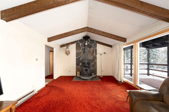 unfurnished living room with lofted ceiling with beams, a textured ceiling, a baseboard heating unit, carpet flooring, and a wood stove