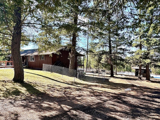 view of side of property with an exterior structure and an outdoor structure