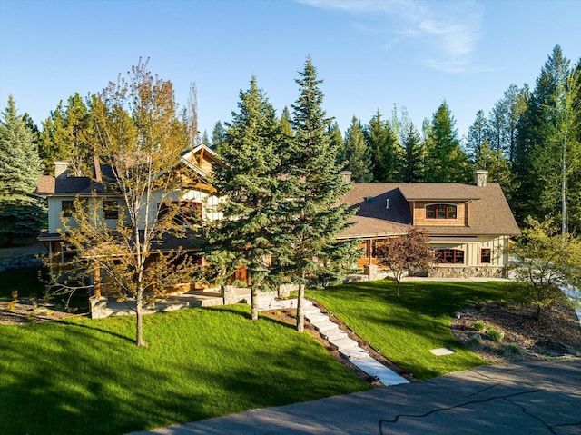 view of front of home with a front yard