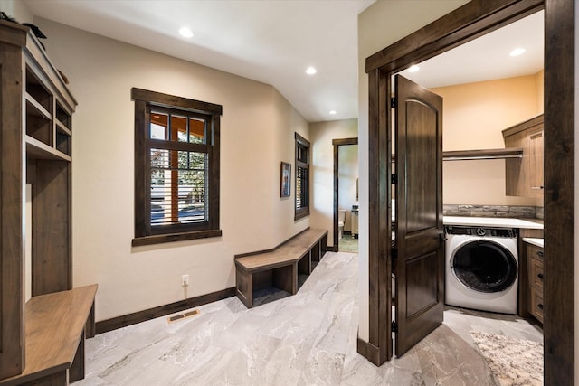 113 Levi Ct, Bigfork, MT 59911 - laundry area featuring washer / clothes dryer, recessed lighting, and light marble finish floors