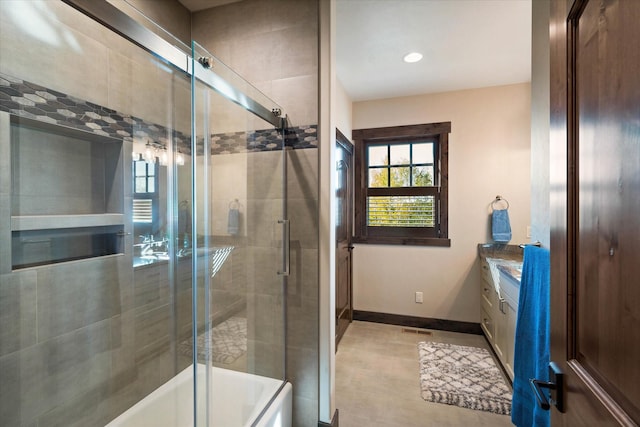 113 Levi Ct, Bigfork, MT 59911 - full bath with vanity, enclosed tub / shower combo, and recessed lighting