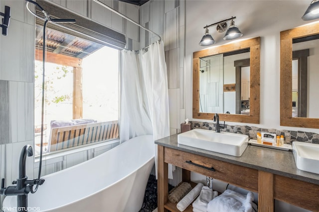 76 Rusty Iron Way, Eureka, MT 59917 - bathroom with a freestanding bath, double vanity, and a shower with curtain