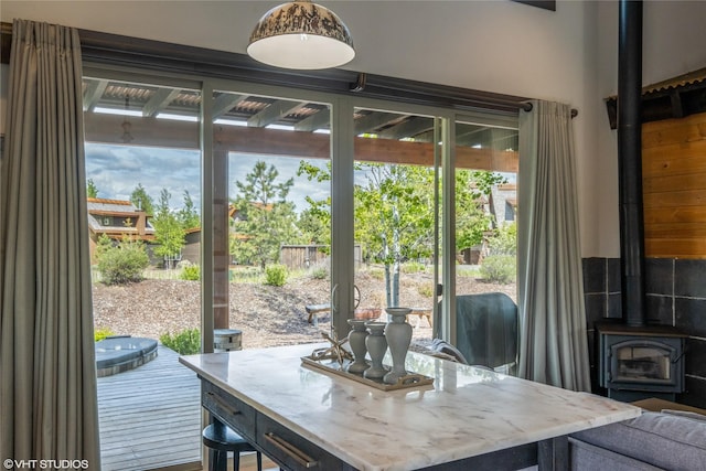 76 Rusty Iron Way, Eureka, MT 59917 - dining room featuring a wood stove