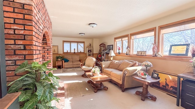 6809 N Montana Ave, Helena, MT 59602 - carpeted living area featuring a brick fireplace