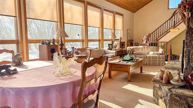 6809 N Montana Ave, Helena, MT 59602 - dining area featuring carpet, high vaulted ceiling, wooden ceiling, and stairway