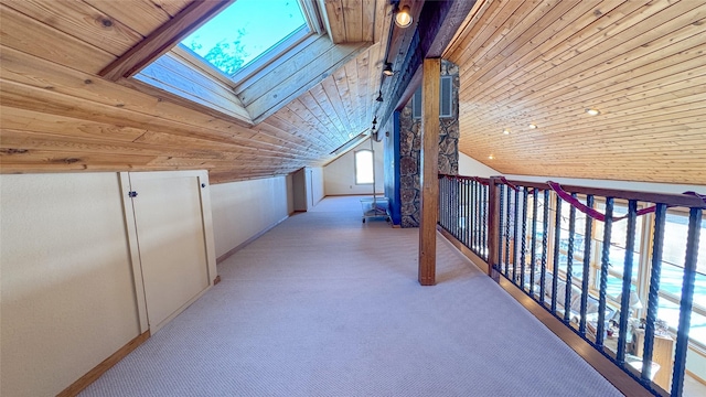 6809 N Montana Ave, Helena, MT 59602 - hall with a skylight, lofted ceiling, wood ceiling, and light colored carpet