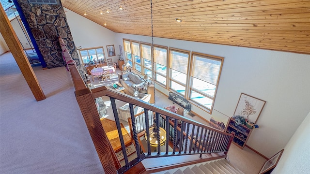 6809 N Montana Ave, Helena, MT 59602 - stairs featuring wooden ceiling, vaulted ceiling, and carpet flooring