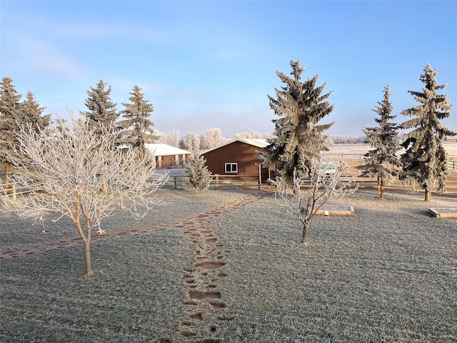 view of front of house featuring a rural view