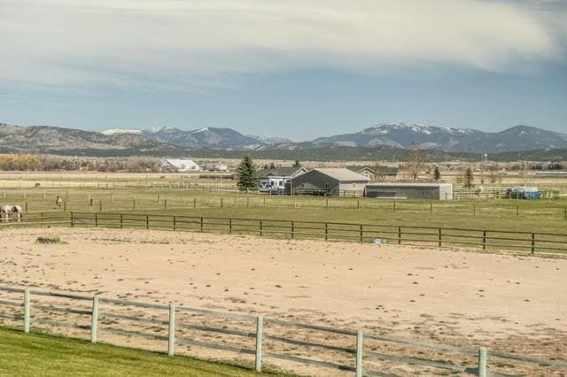 6809 N Montana Ave, Helena, MT 59602 - view of yard with a view of rural / pastoral area, an enclosed horse arena, and a mountain view