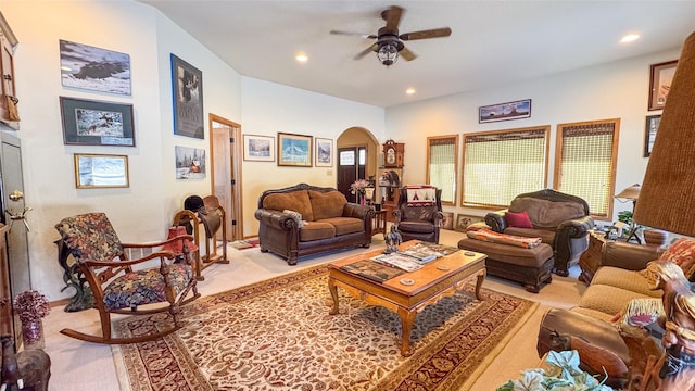 6809 N Montana Ave, Helena, MT 59602 - living room featuring arched walkways, light colored carpet, ceiling fan, and recessed lighting
