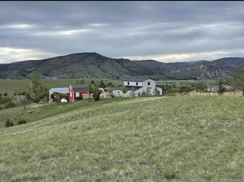 view of mountain feature featuring a rural view