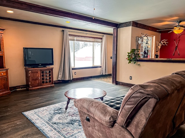 living room with hardwood / wood-style floors and ceiling fan