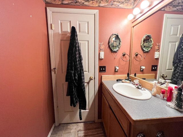 bathroom featuring vanity and tile patterned flooring