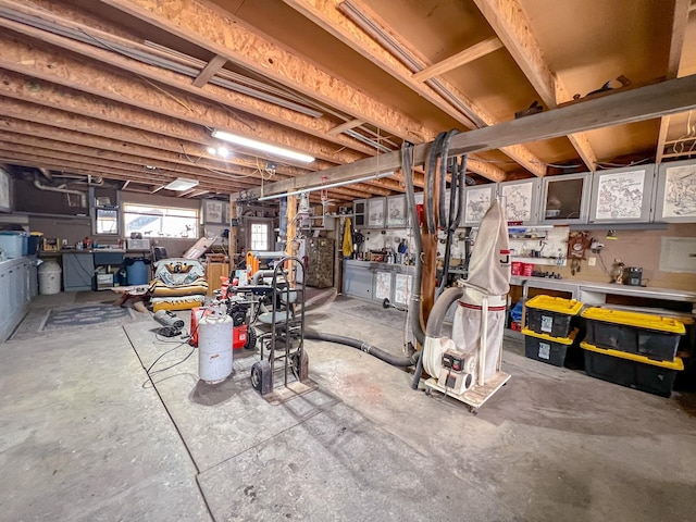 basement with a workshop area