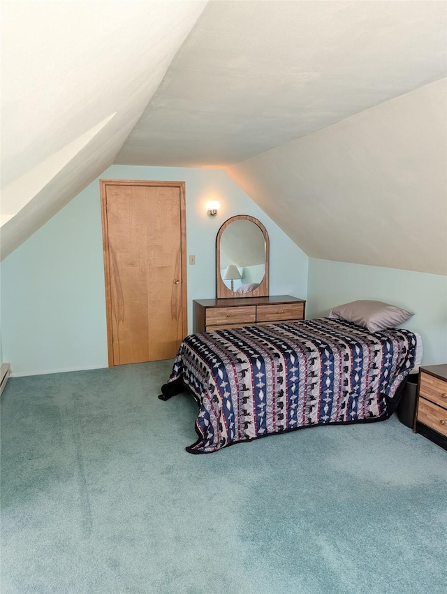 carpeted bedroom with lofted ceiling