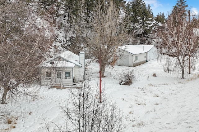 view of yard covered in snow