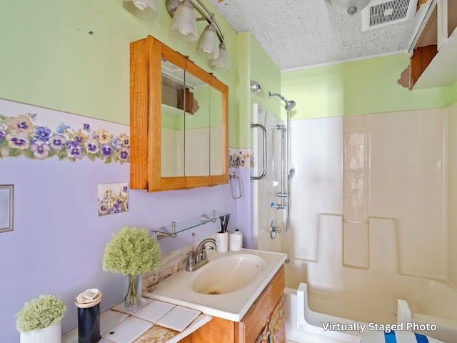 full bathroom featuring shower / bathtub combination, visible vents, and vanity