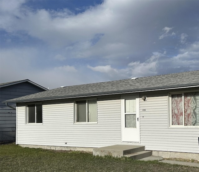 605 Idaho St, Deer Lodge, MT 59722 - rear view of house featuring a shingled roof