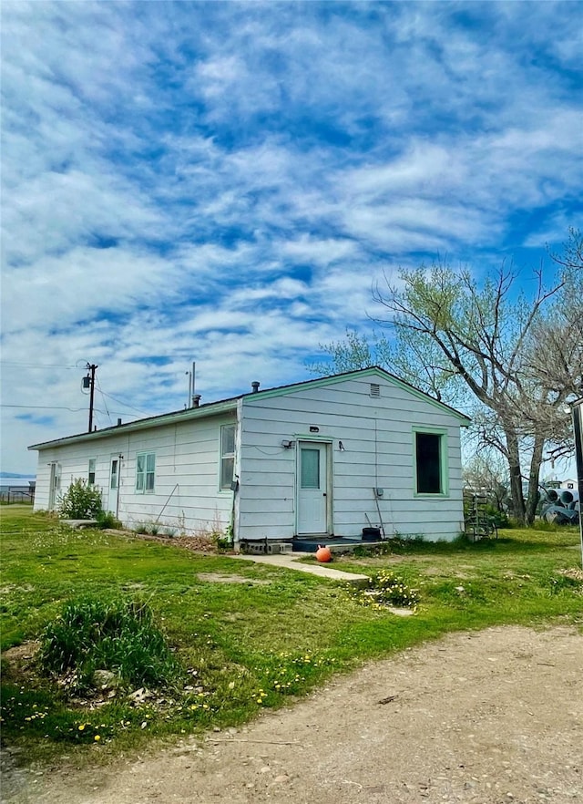 200 Cleveland Rd, Chinook, MT 59523 - back of house with a yard