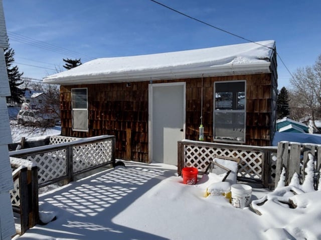 view of snow covered deck