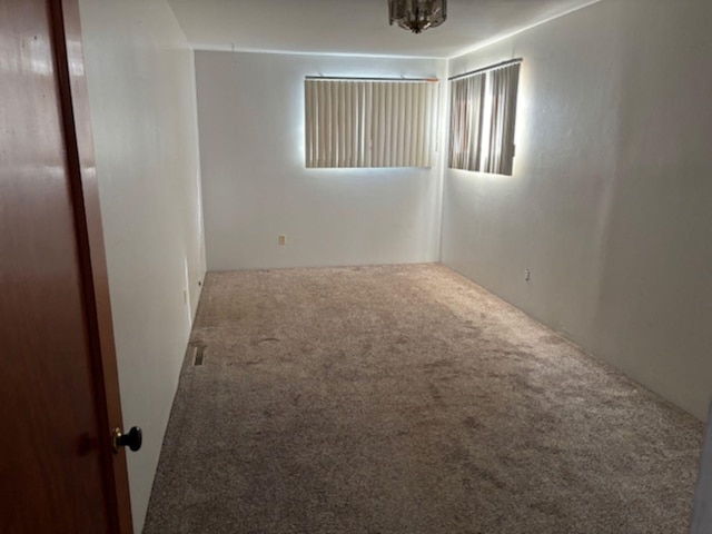 unfurnished room with carpet floors