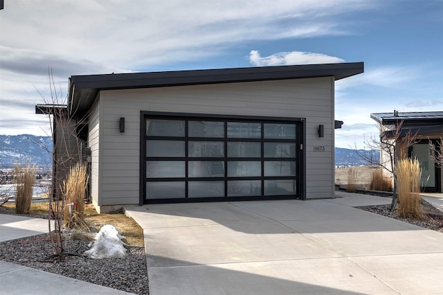 detached garage with a mountain view