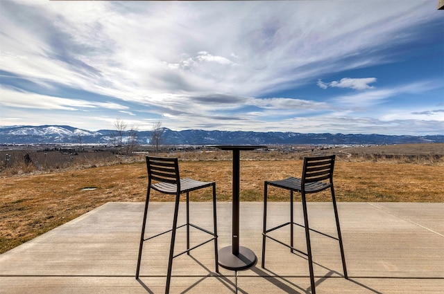 view of patio featuring a mountain view