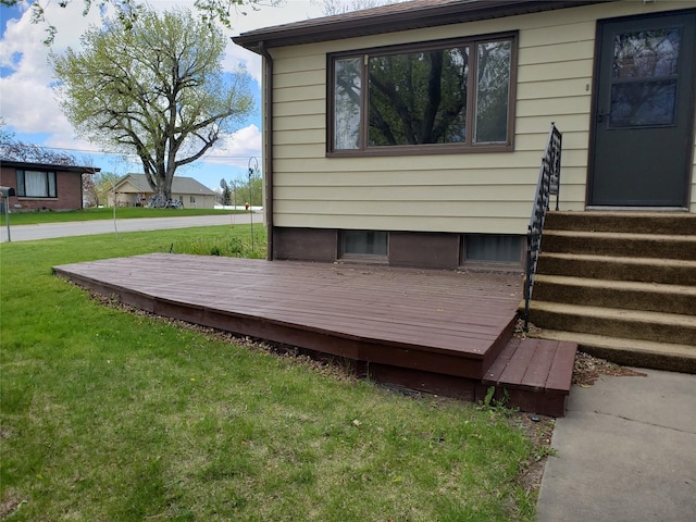 deck featuring a lawn