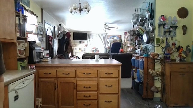 kitchen featuring ceiling fan with notable chandelier and dishwasher