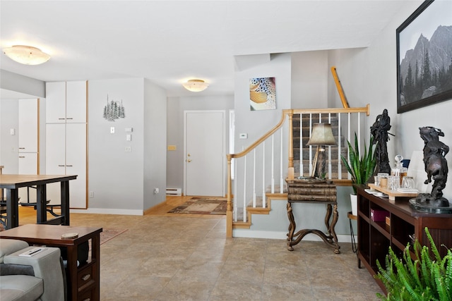 interior space with a baseboard radiator and wood finished floors