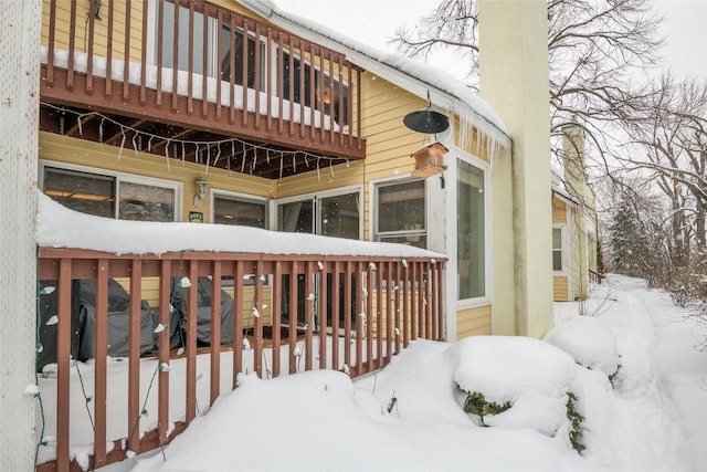 view of snow covered property