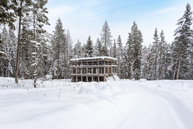 view of snow covered house