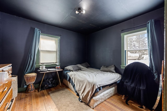 bedroom featuring hardwood / wood-style flooring