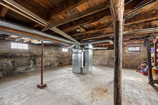 basement featuring heating unit