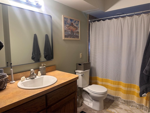 full bathroom with vanity and toilet