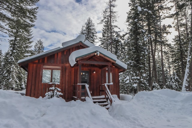 rustic home featuring board and batten siding