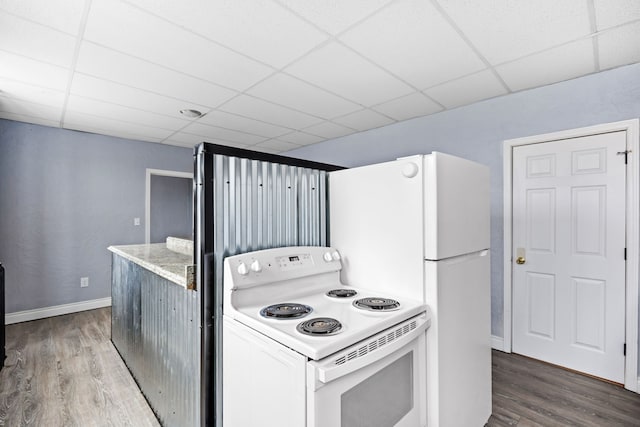 kitchen featuring hardwood / wood-style floors, white range with electric stovetop, and a drop ceiling