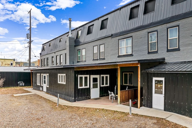 back of house featuring a patio