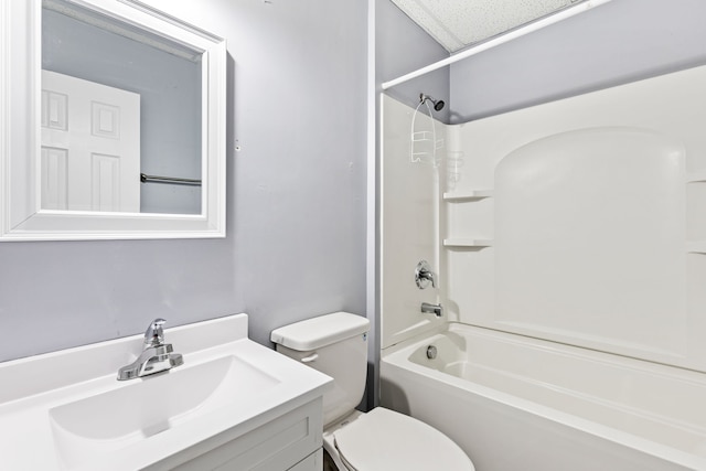 full bathroom featuring vanity, tub / shower combination, and toilet