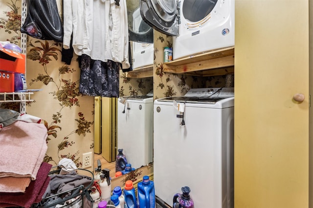 laundry room featuring washing machine and dryer