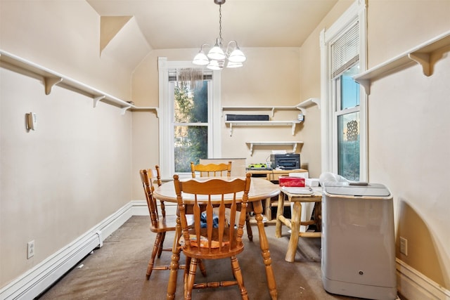 dining room with carpet floors and a notable chandelier