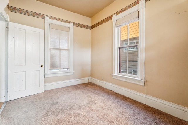 empty room featuring carpet floors