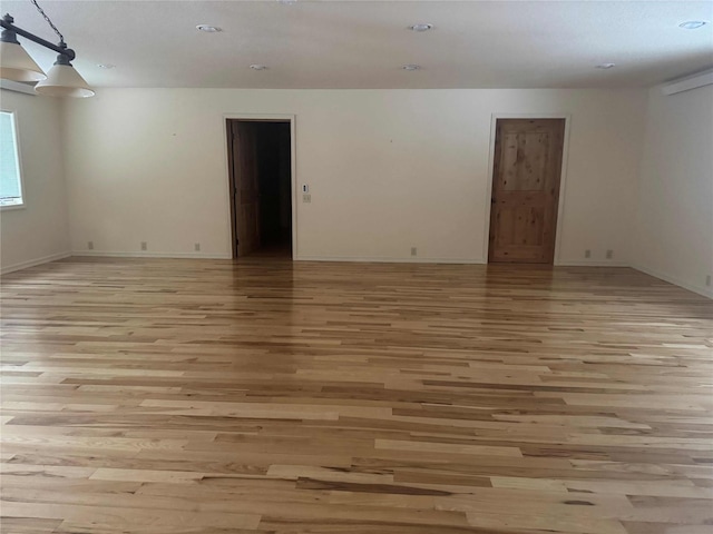 empty room featuring light hardwood / wood-style floors