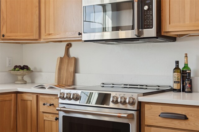 211 Mcwenneger Dr, Kalispell, MT 59901 - kitchen featuring stainless steel appliances and light countertops