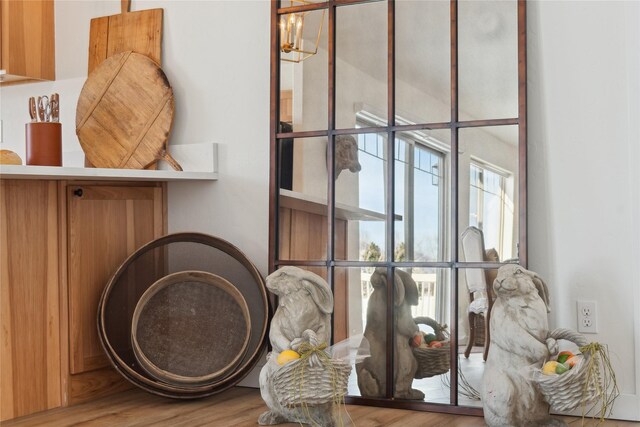 211 Mcwenneger Dr, Kalispell, MT 59901 - detailed view of wood finished floors and a chandelier