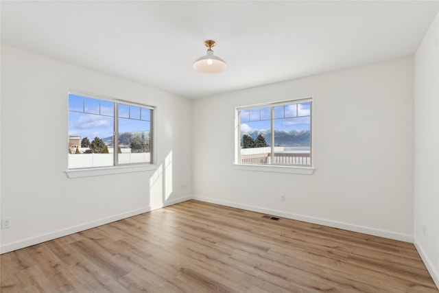 211 Mcwenneger Dr, Kalispell, MT 59901 - empty room featuring wood finished floors