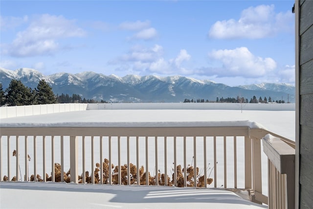 211 Mcwenneger Dr, Kalispell, MT 59901 - wooden terrace with a mountain view