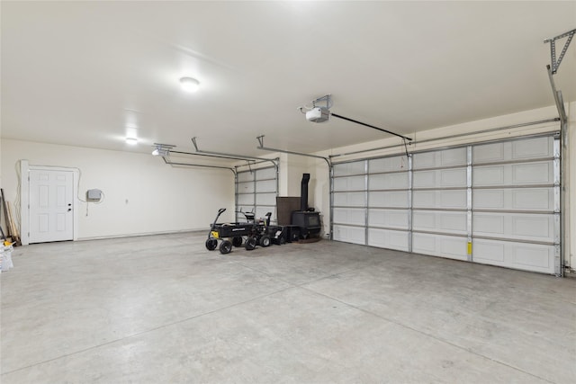 garage featuring a garage door opener