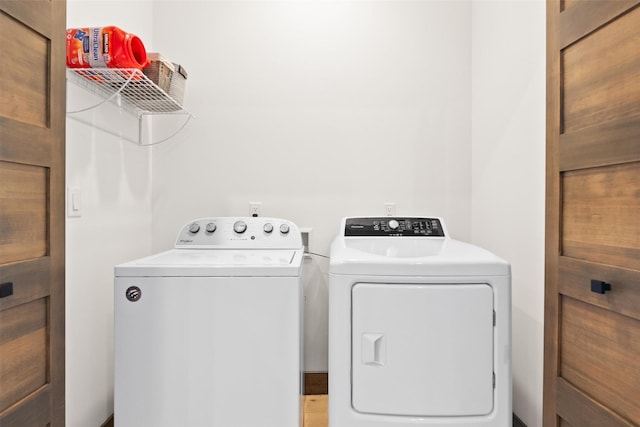 washroom with washer and clothes dryer